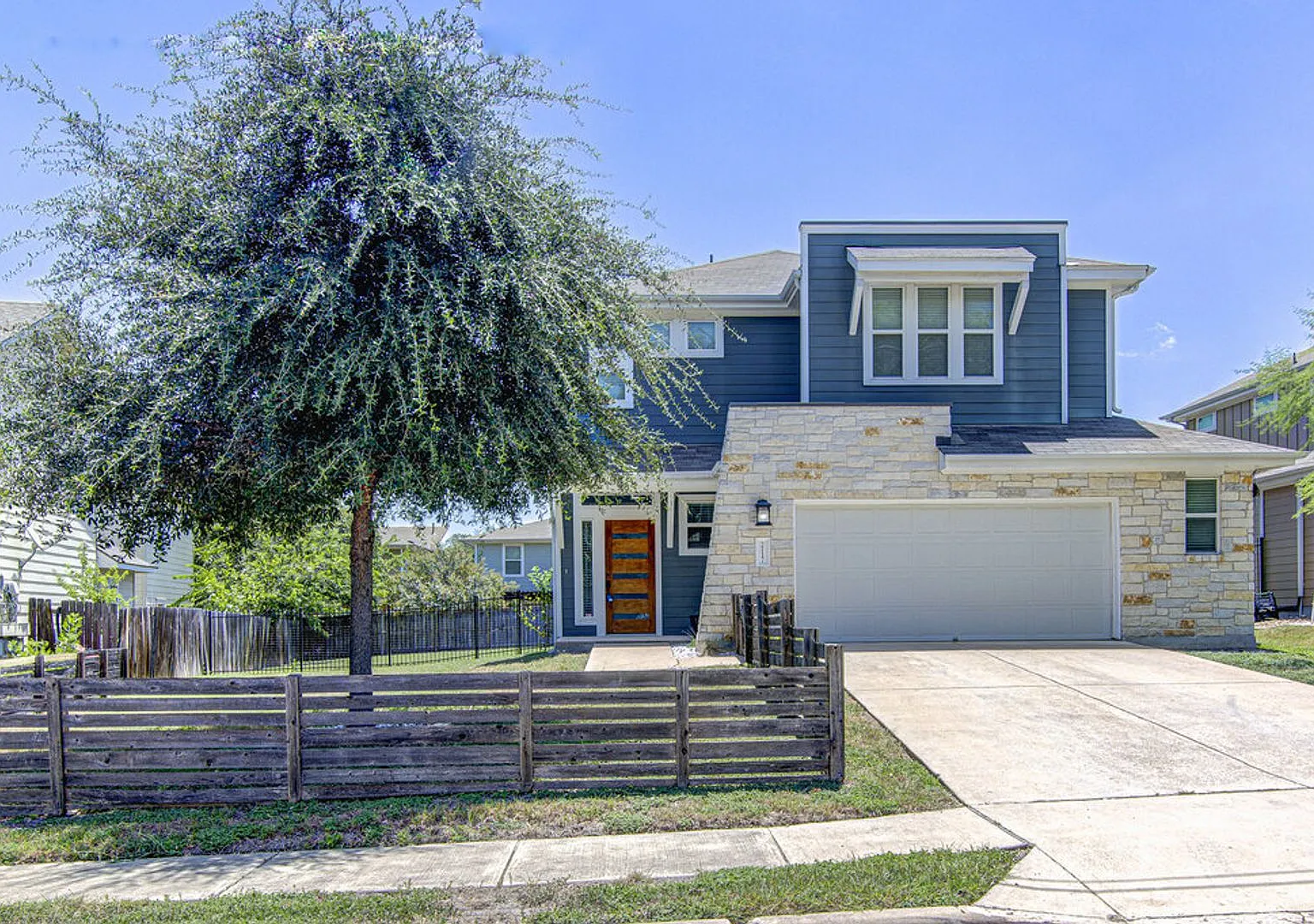Elegant 4BR Home with Bonus Room & Designer Finishes — Photo 1