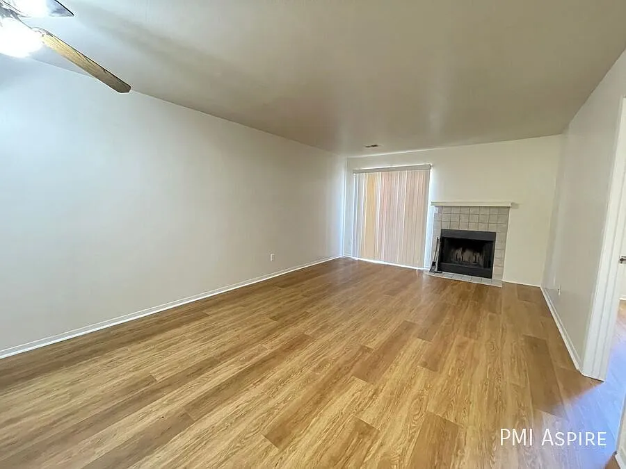 "Charming 2-Bed Retreat with Cozy Fireplace in Longmont Your Perfect 784 Sq Ft Haven!" — Photo 2