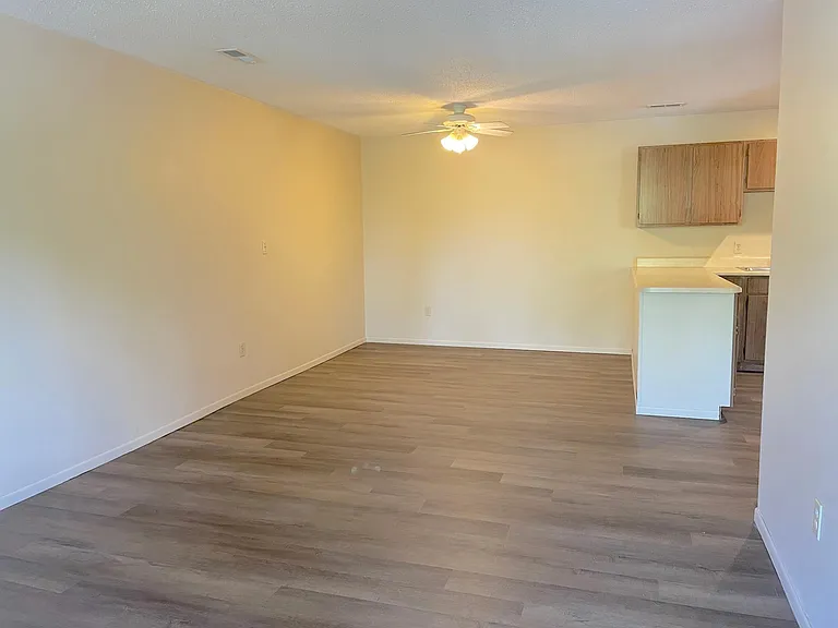 Dining area with ceiling fan.