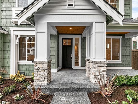 The Stipek plan on Lot 9 is UNDER CONSTRUCTION! This photo is taken of a sold home of the same floorplan in a different community.  Home has not yet been painted.  Colors, Design, Features are subject to change.