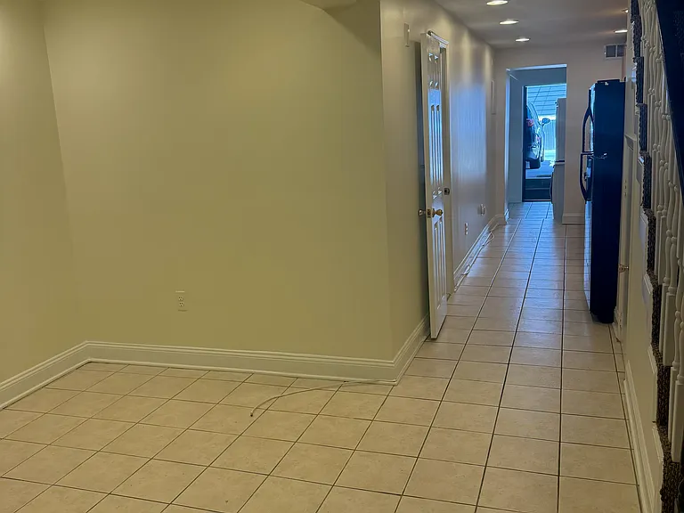 Living room area and galley kitchen