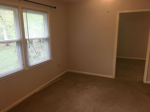 Living room, looking towards dining room.