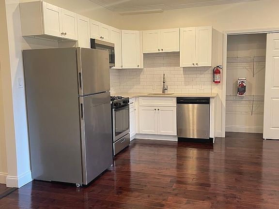 updated kitchen with spacious pantry closet