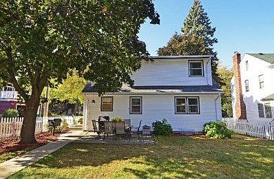 Private back yard with patio and extensive landscaping