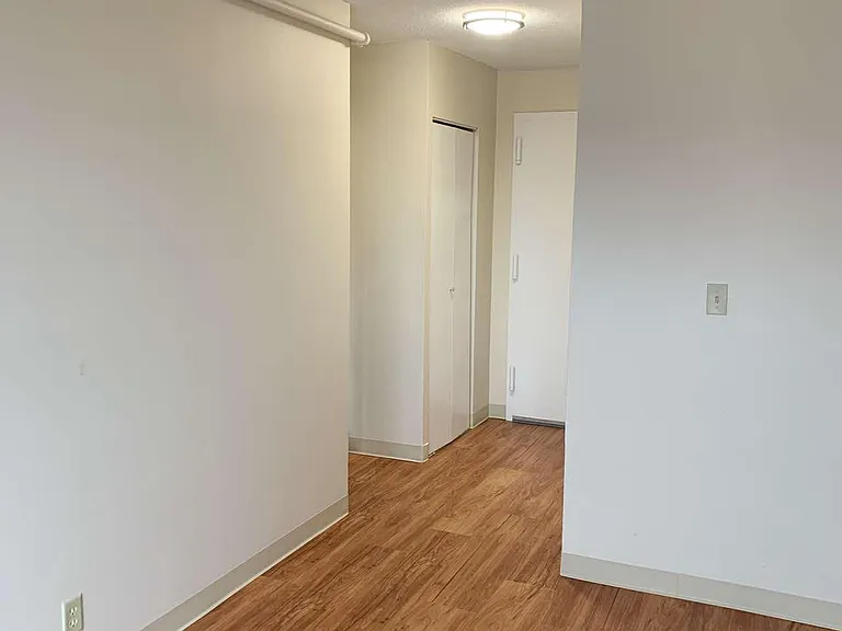 Hallway with convenient closet spaces
