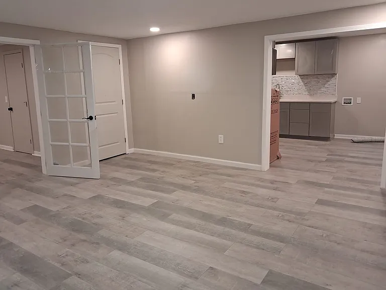 Living Room area, entrance to Kitchen. New wood floor