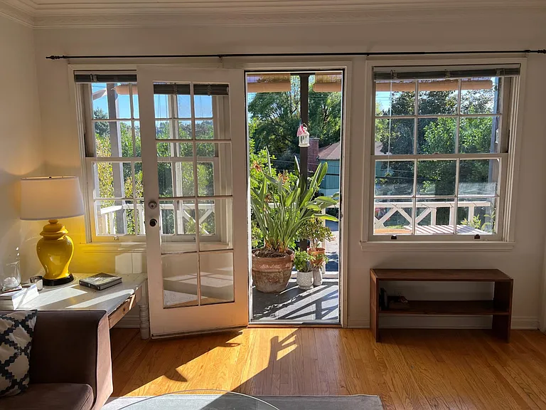 Living room, and door to the balcony