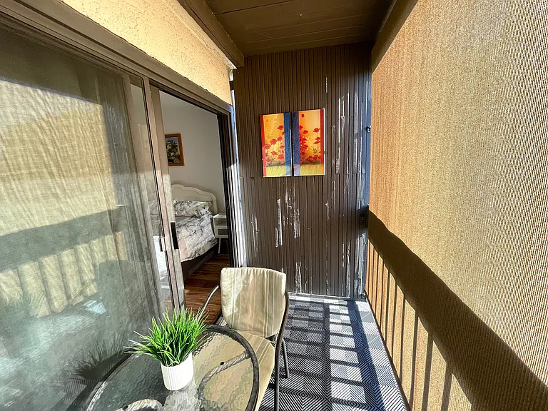 Coffee time on a cool shaded balcony.