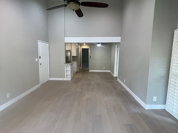 Living room with view of dining room