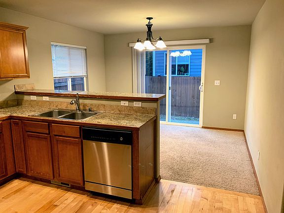 Dinning Room w/sliding door to the fenced backyard