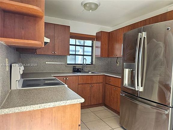 5th image of 13220 SW 58th Ter #Townhouse 16-1