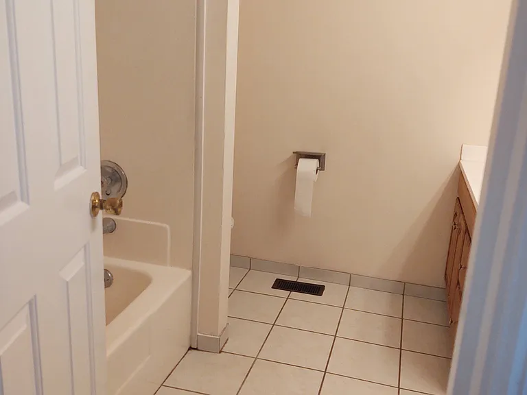 entrance to 2nd floor bathroom tile floor.