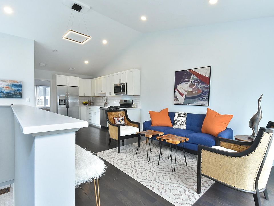 Open-Concept Living Space with beautiful vaulted ceilings.