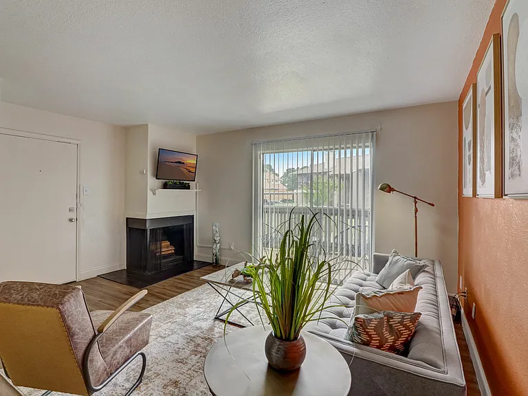 Cozy Fireplace Living Room at Oak Park Apartments