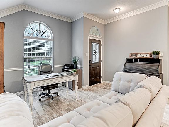 Living space to the right of the entry. It can be used as an office or formal living area or combination of both.