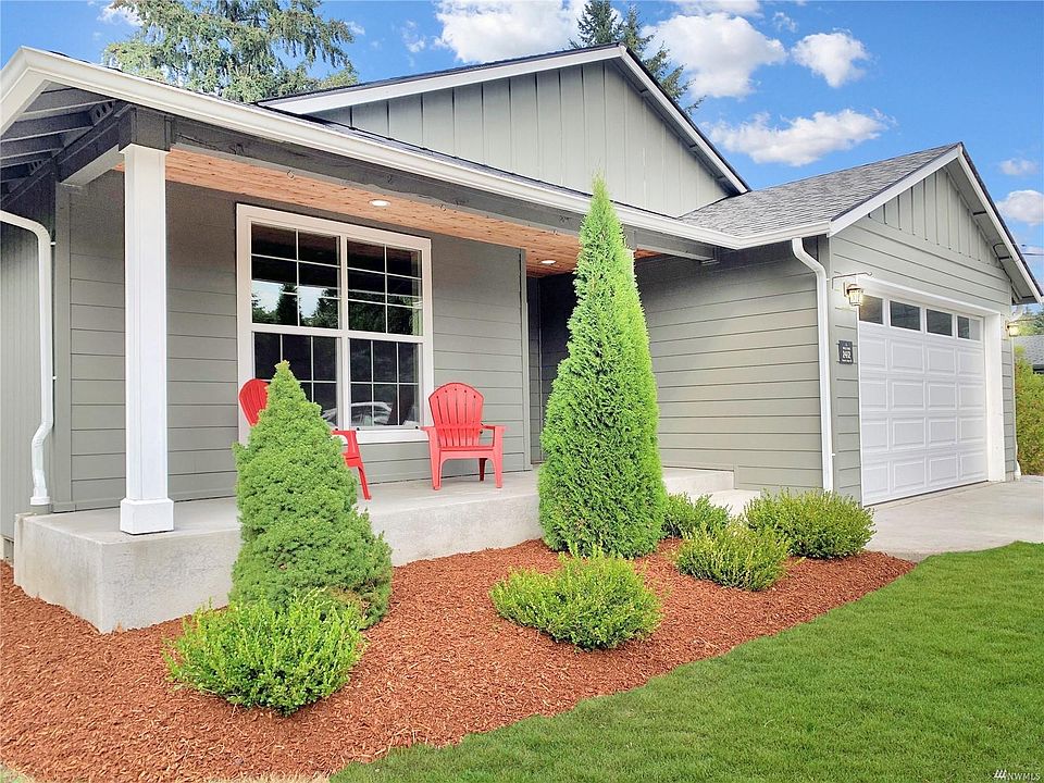 Charming front porch greets visitors.