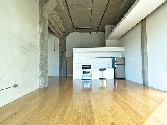 Gleaming Hardwoods & 18' Ceilings