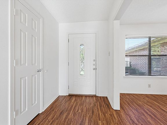 Spacious entry foyer with coat closet