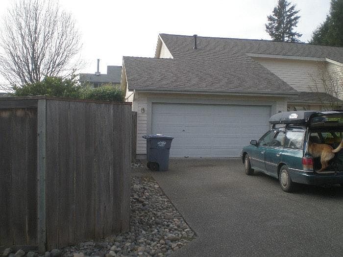 2 car garage with loft storage and fenced back yard