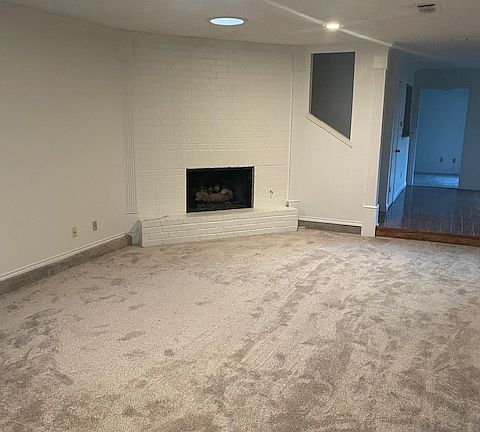 living room, new paint and carpet throughout