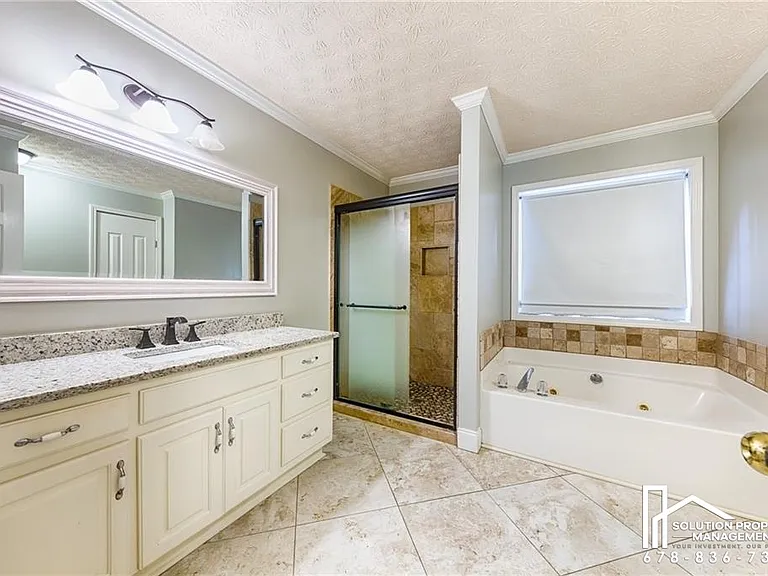 4929 Baker Plantation Way — Photo 14