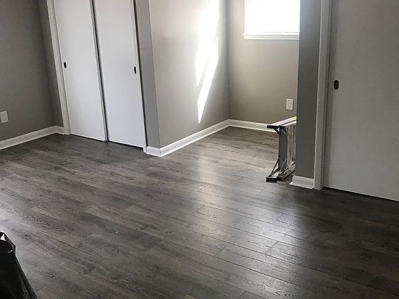 Master bedroom-brand new flooring, his or her closets, Tons of natural light.