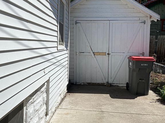 Nice long driveway with single detached garage/storage shed,