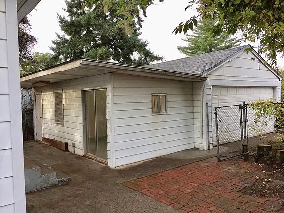 Back yard with garage and bonus room