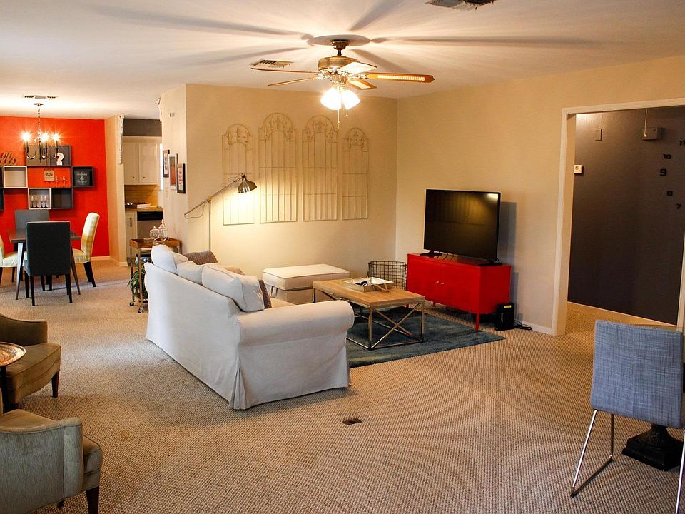 Living Room, which includes three sitting areas.