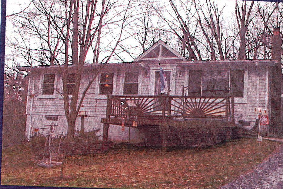 Large front yard 200+ft from road. Large backyard completely fenced in. 
