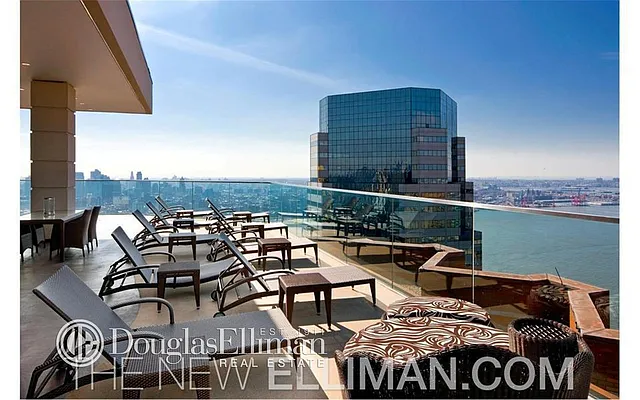 Sold by Douglas Elliman | media 9