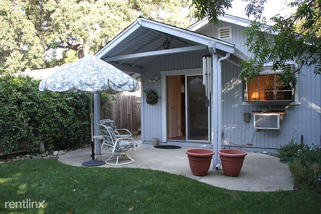 Entrance and enclosed yard.