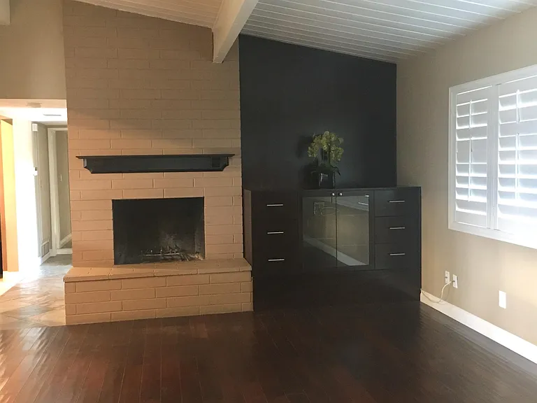 Custom built cabinet, ready for your big screen TV. Wood burning fireplace.
