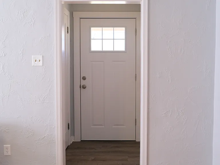 Entrance with 2 coat closets.
