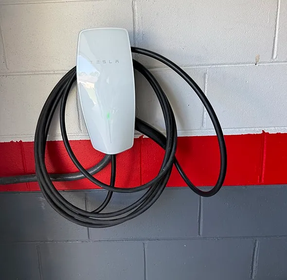 Electric vehicle charger in garage
