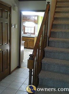 View of foyer with 3 entries  into house