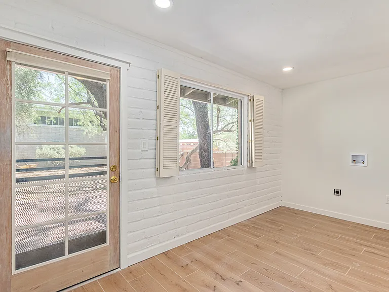 MUD ROOM WITH WASHER & DRYER THAT LEADS TO THE SECOND YARD AND DETACHED GARAGE