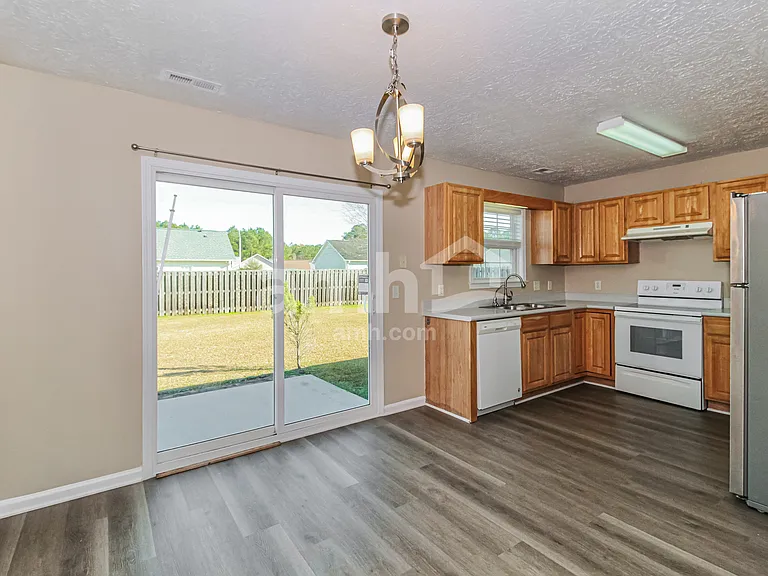 9488 NE Huckabee Ct — Photo 7