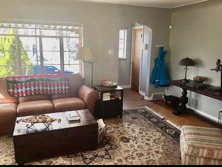 Same living room, older picture different angle, plenty of light