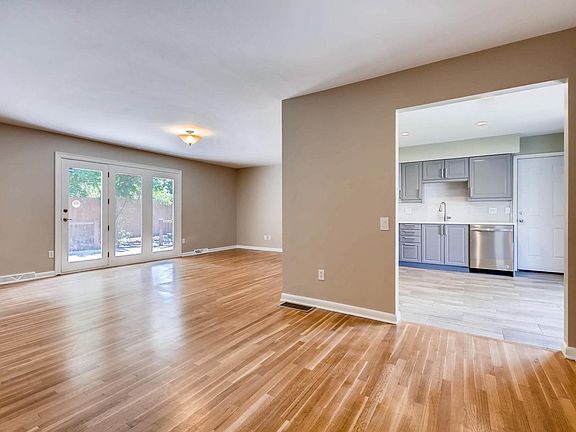 Dining room and living room with view to kitchen