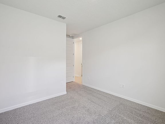 The Jasmine Floorplan Bedroom Represented at Two Rivers