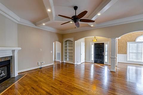 LR facing front entry; to left are two bedrooms and full bath, to right is DR