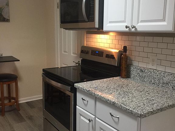 Brand new stainless steel appliances include convenience of an over the range microwave