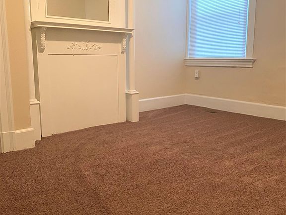 Bedroom with brand new carpeting