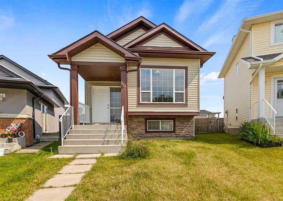 1st image of 86 W Saddlemont Close NE