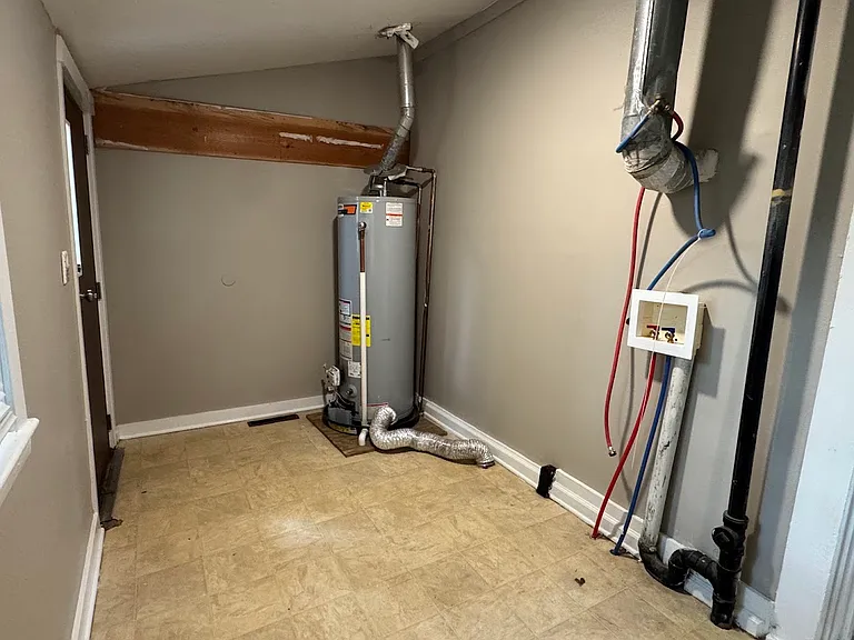 Laundry room off of kitchen