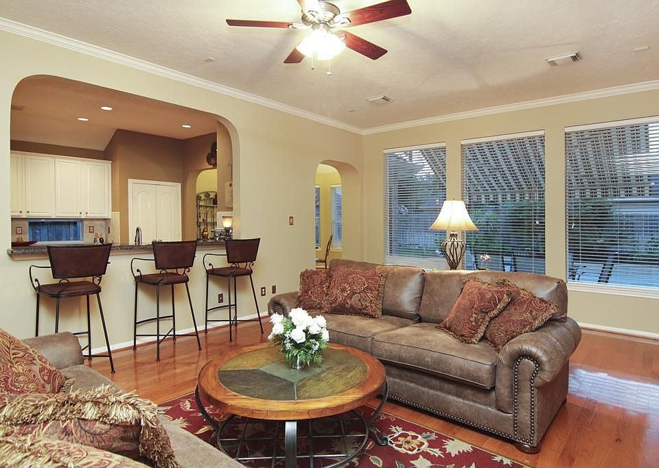 Living Room - This home features fabulous wood floors through-out, neutral colors & and open floor plan GREAT for entertaining!
