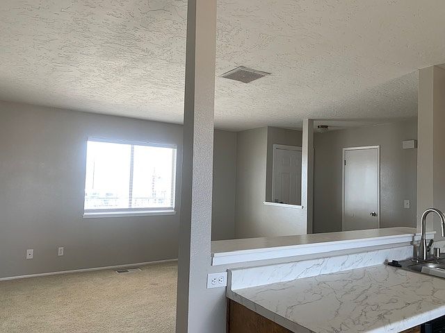 View of the living area from kitchen