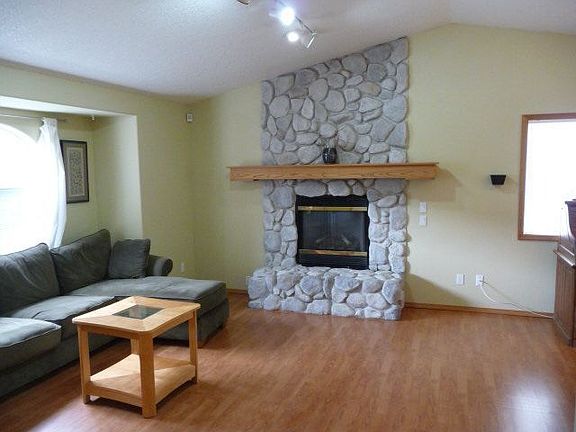 16x14 living room with gas fireplace.