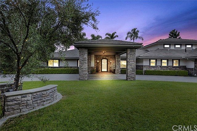 Stunning curb appeal and beautifully landscaped large front yard